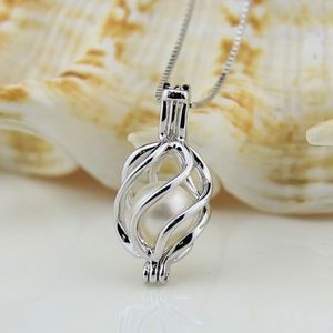 Pretty Pearl in a Silver Cage comes with Chain